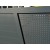 détail perforation carré sur tôle alu pour portail coulissant alu en forme de V motorisé ou manuel                          