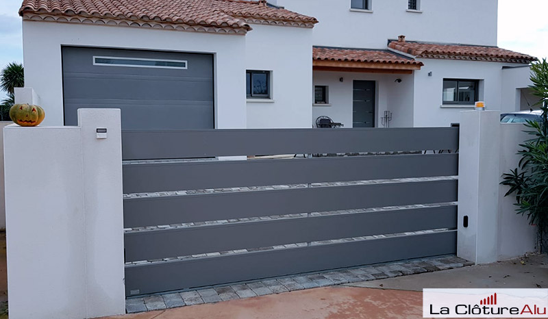 Pose portail en aluminium ajouré dans le 34
